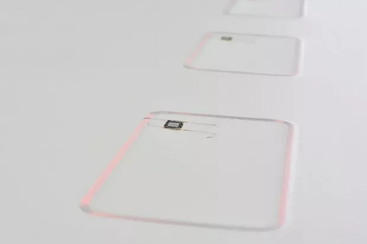 Antenna production by wire embedding Cover